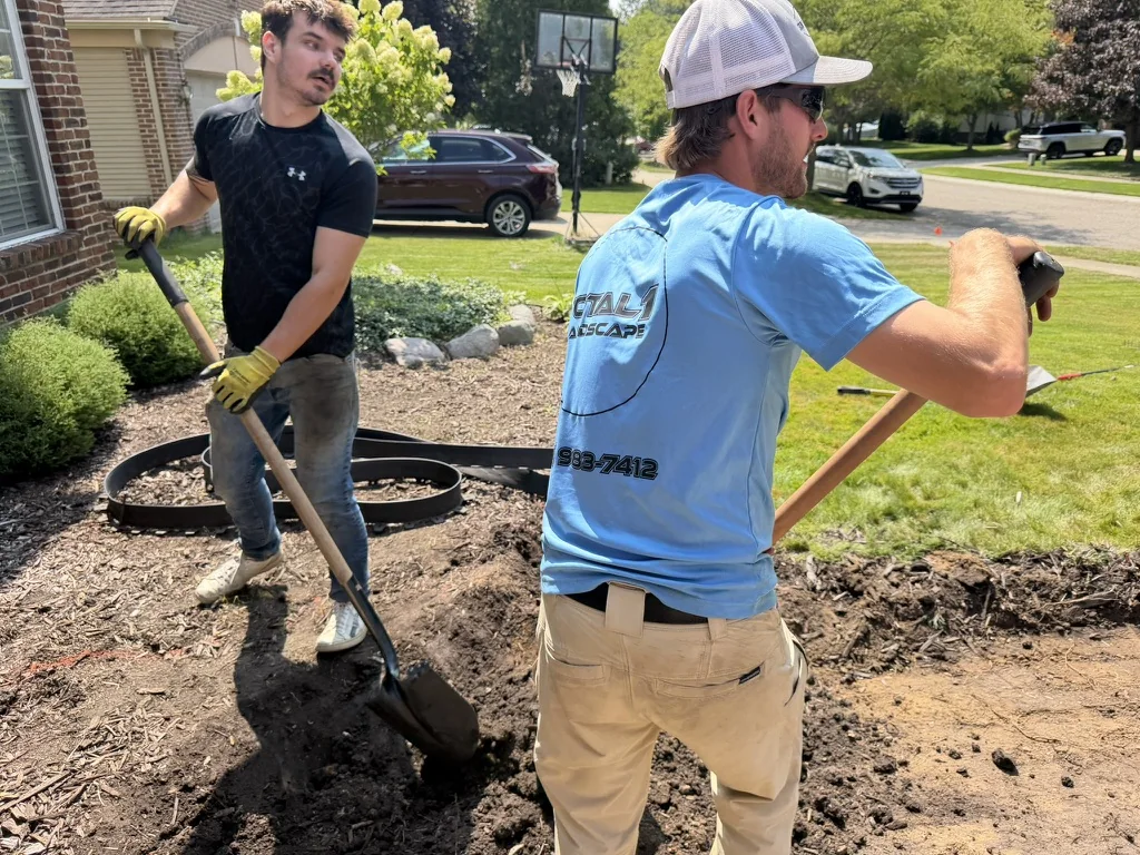Total 1 crew completing hands-on soil preparation at a residential property